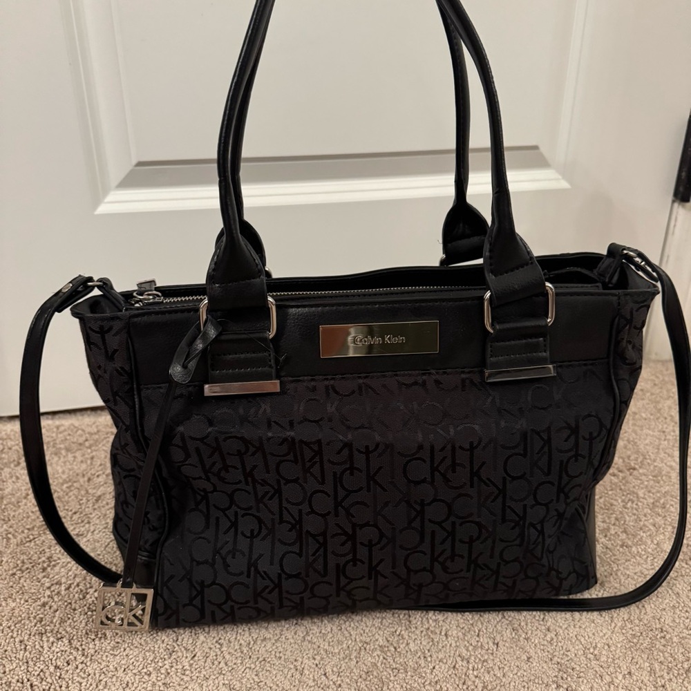 Calvin Klein Black Shoulder Bag with Adjustable Strap and Silver Hardware